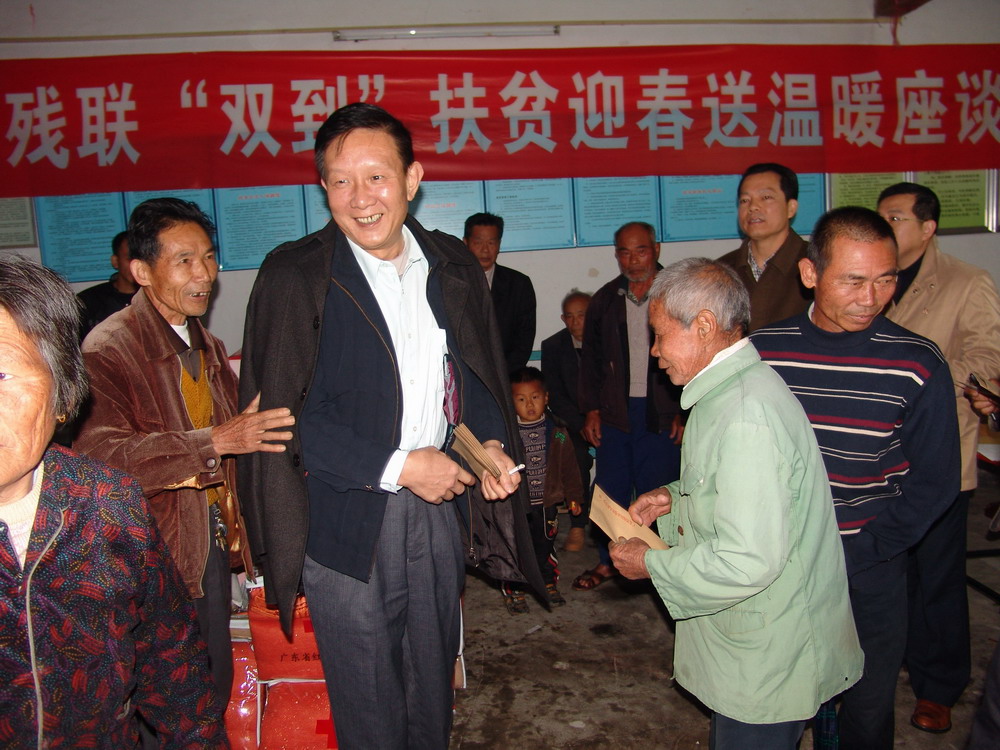 市残联与团市委携手到古杭村开展春节慰问活动(图2)